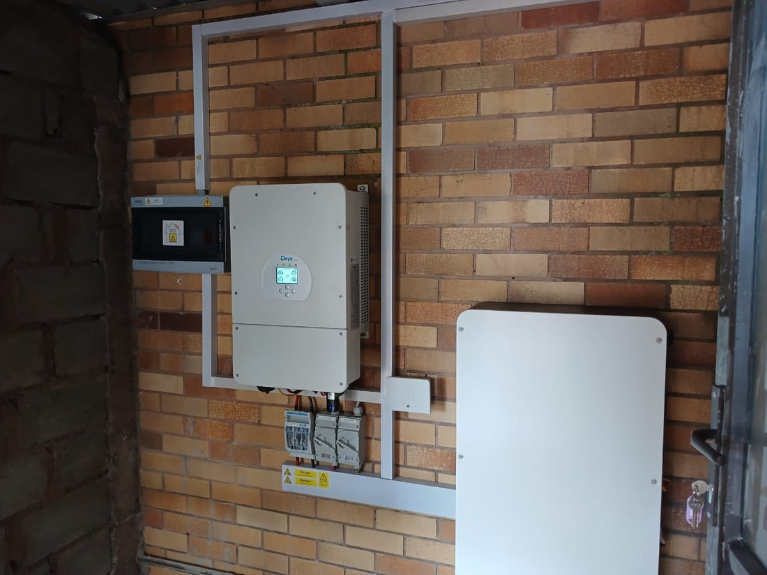 Deye Solar Inverter and Battery Mounted to Brick Wall with DV Board.